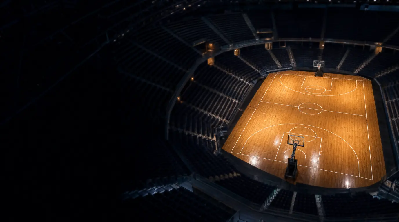 Aerial view of a basketball arena at night