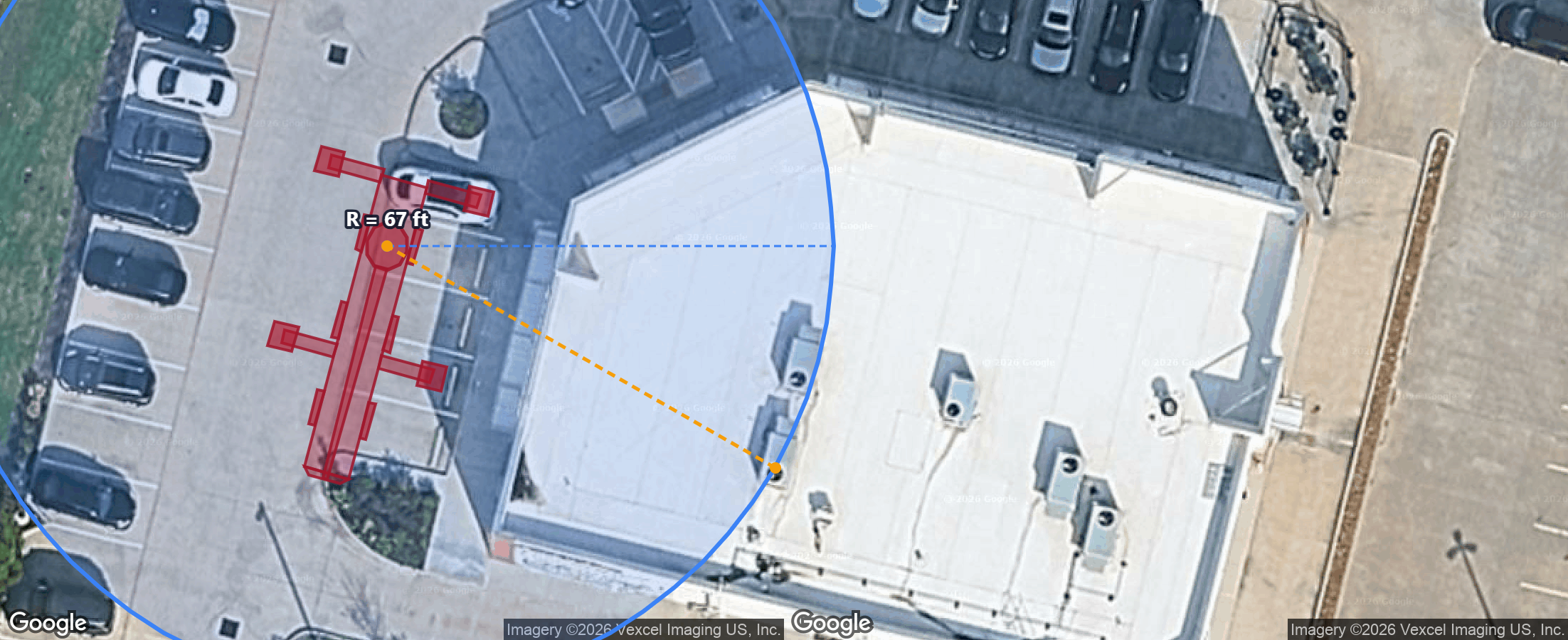 Satellite site plan showing a placed crane with its working radius covering a rooftop lift