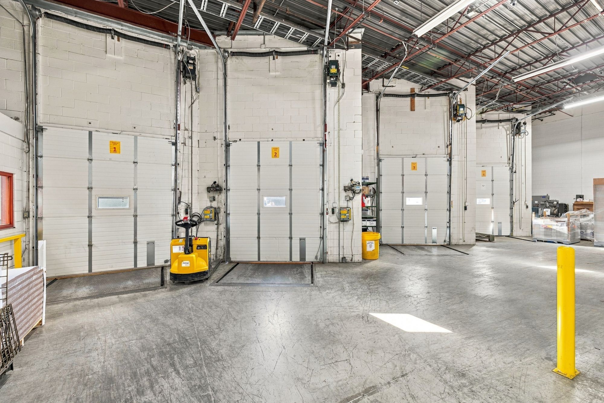 Truck-level shipping doors at 6400 Northwest Drive industrial building