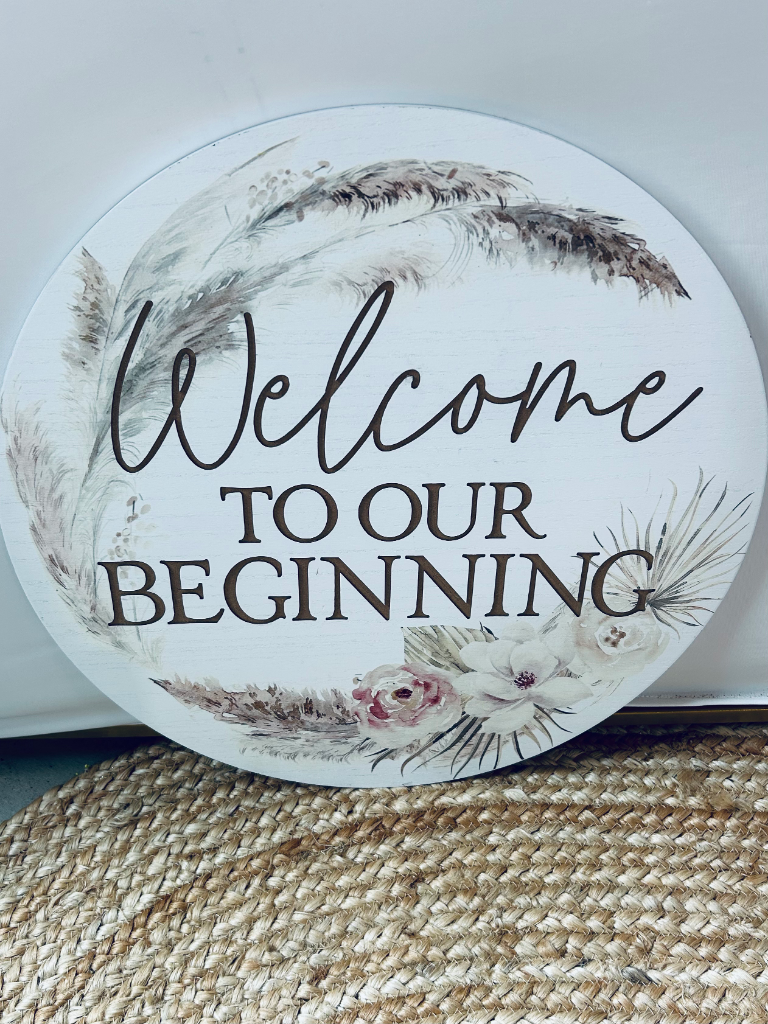 "Welcome to Our Beginning" Round Wood Sign