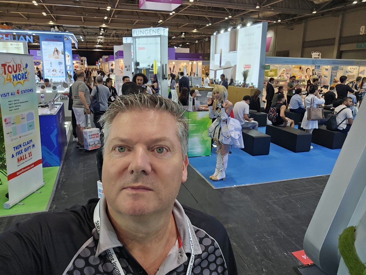 ImageDeep founder Niall Dorr on the floor of a 2026 AI electronics trade show in Asia