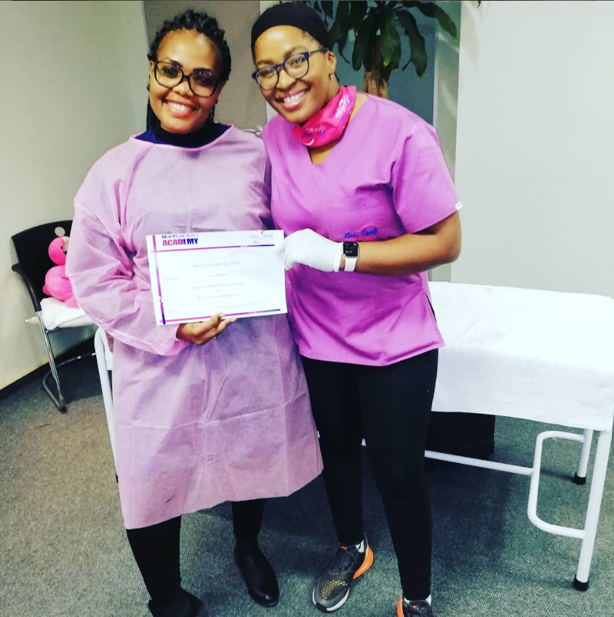 Crystal Waters Spa team with a beauty academy training certificate