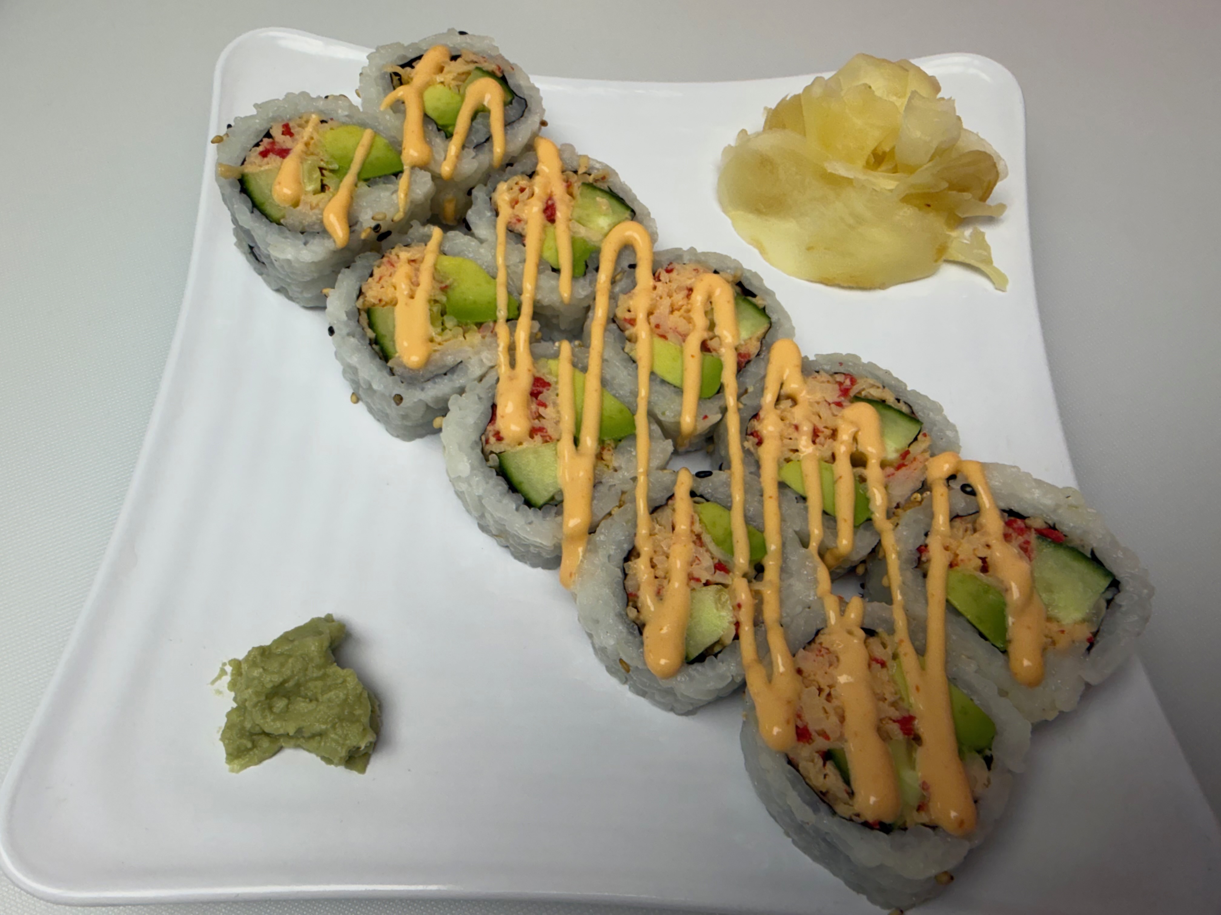 Spicy California Roll — Imitation crab salad, cucumber, avocado, spicy mayo, sesame seed | Sarah Sushi Standard Rolls