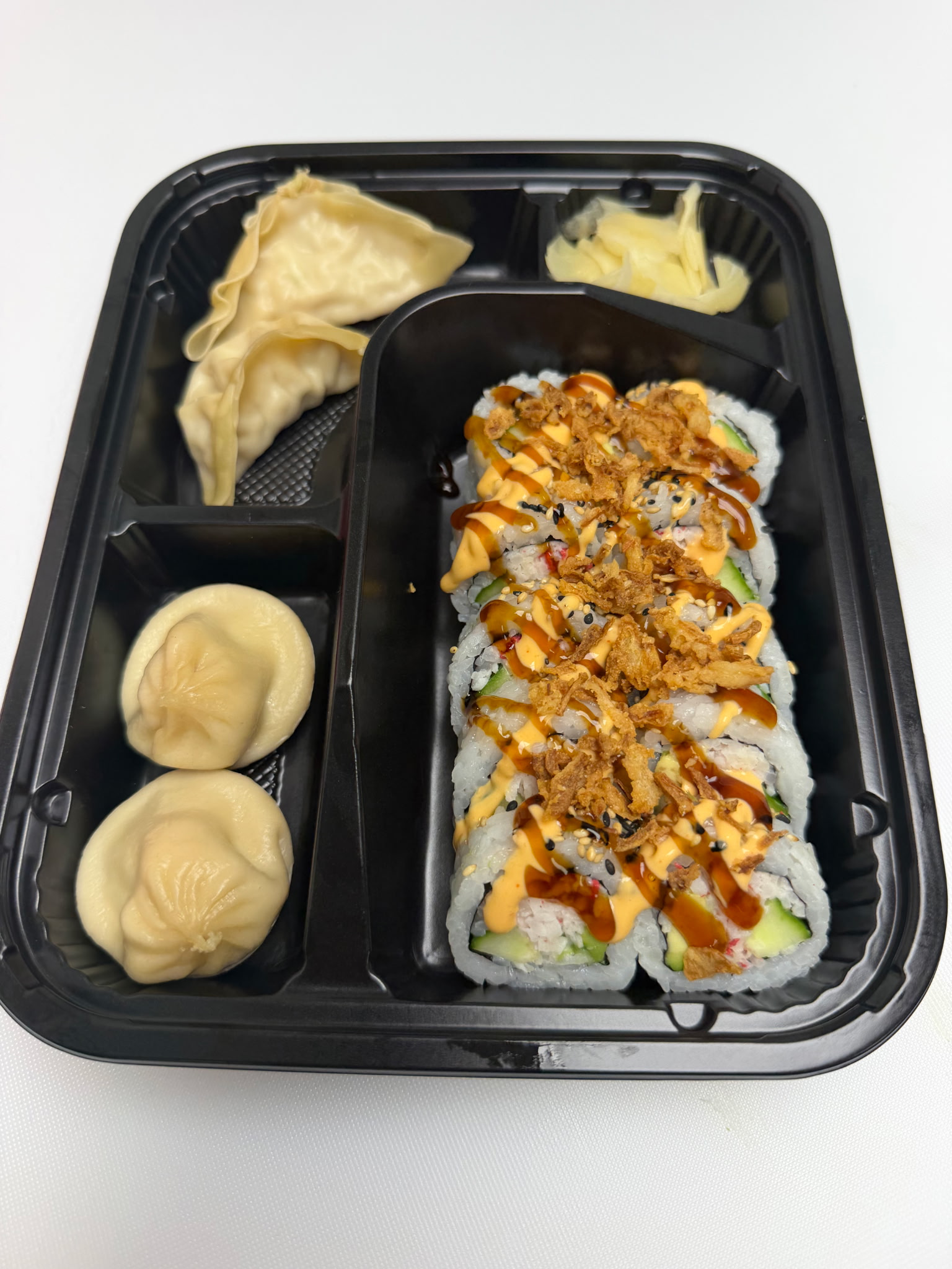 Golden Sarah Combo — 14 pieces — 10 golden crispy, 2 shrimp or chicken dumplings, 2 pork soup dumplings | Sarah Sushi Lunch Special
