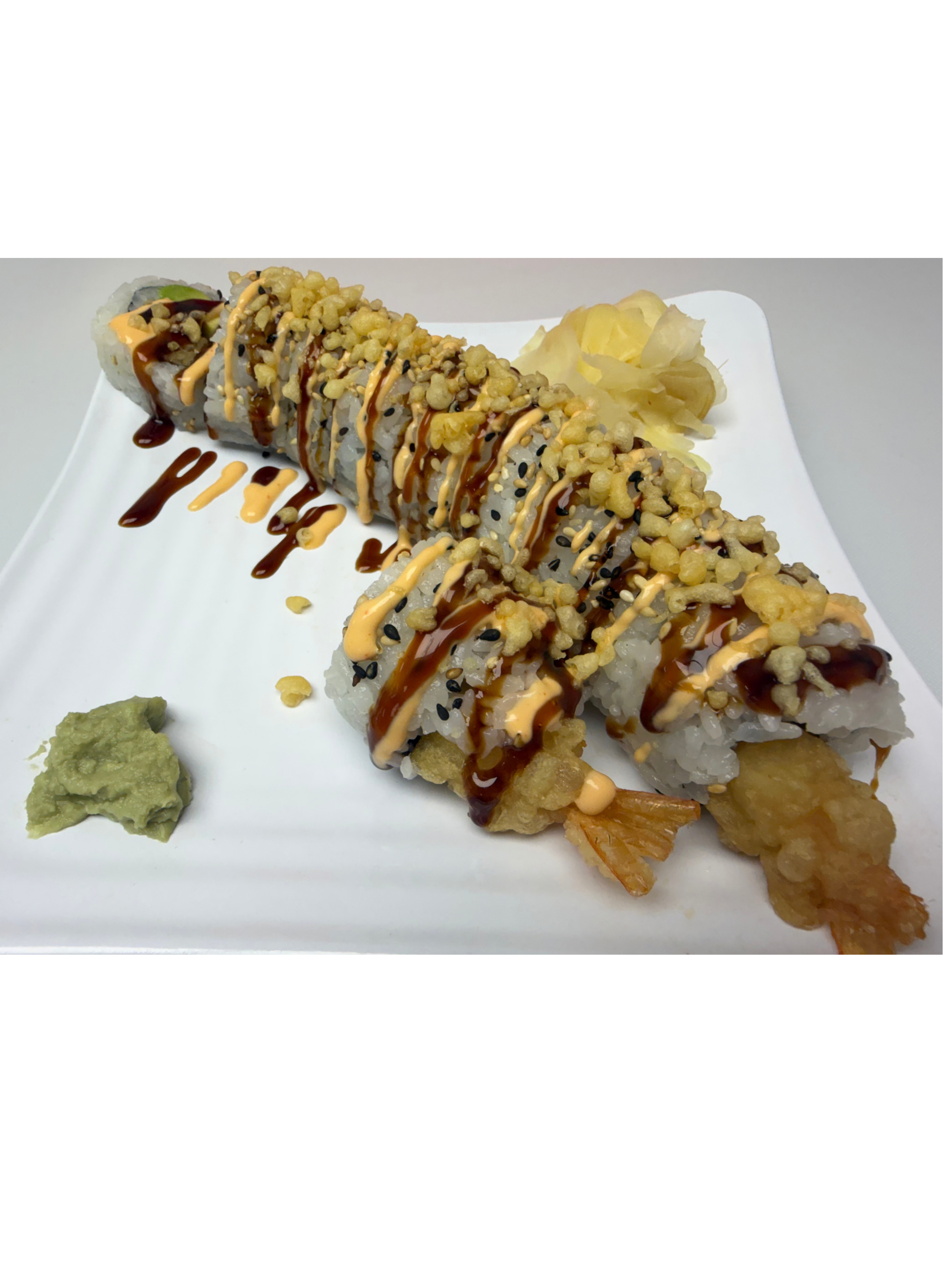 Shrimp Tempura Roll — Tempura shrimp, avocado, tempura crunch, spicy mayo, sushi sauce, sesame seed | Sarah Sushi Specialty Rolls