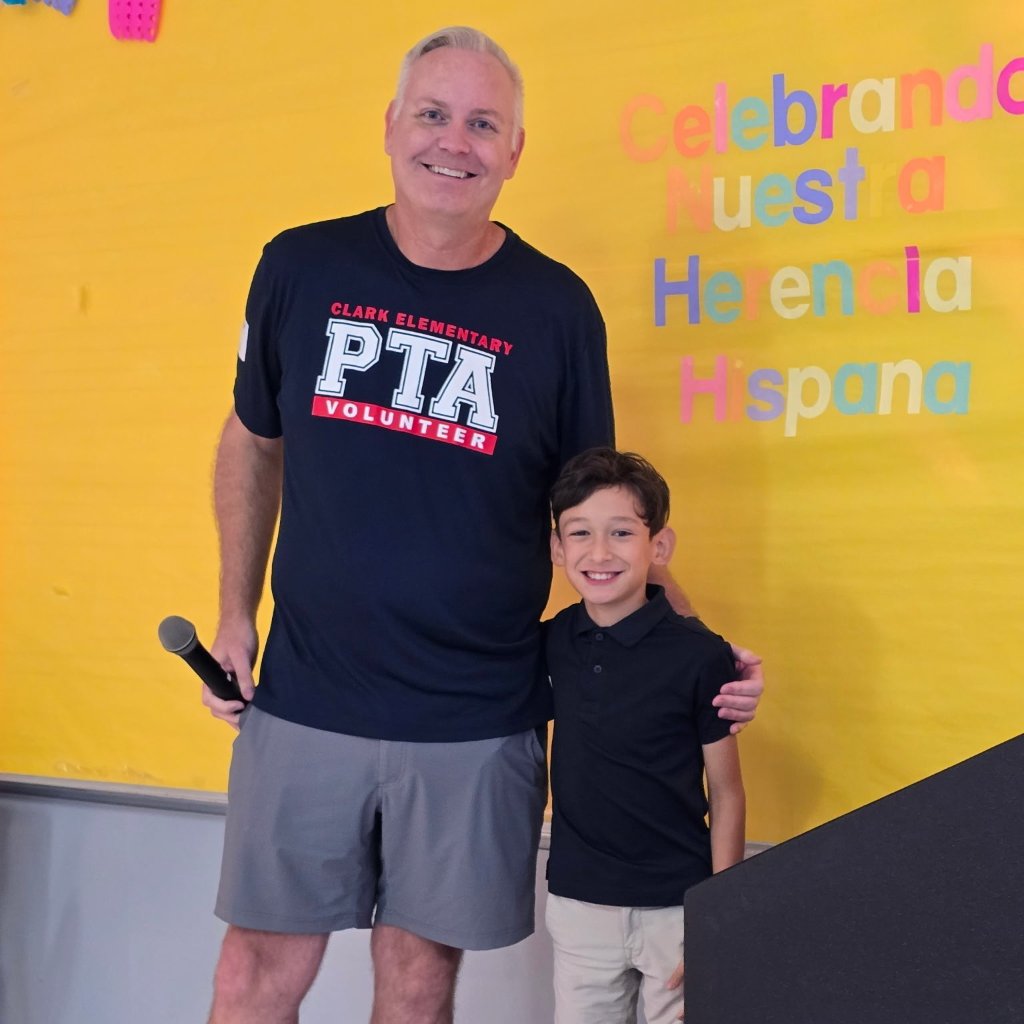 Jeff Sears with a Clark Elementary student