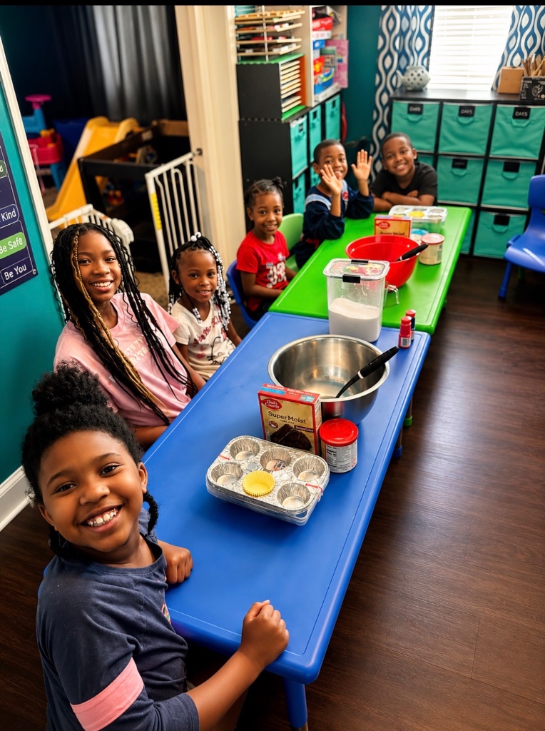 Hands-On Baking Activity Children participating in a hands-on baking activity with mixing bowls and ingredients at Insight Kidz Care.
