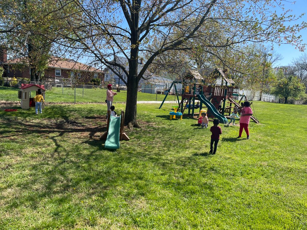 Children enjoying outdoor play at Insight Kidz Care licensed family child care in Baltimore Maryland