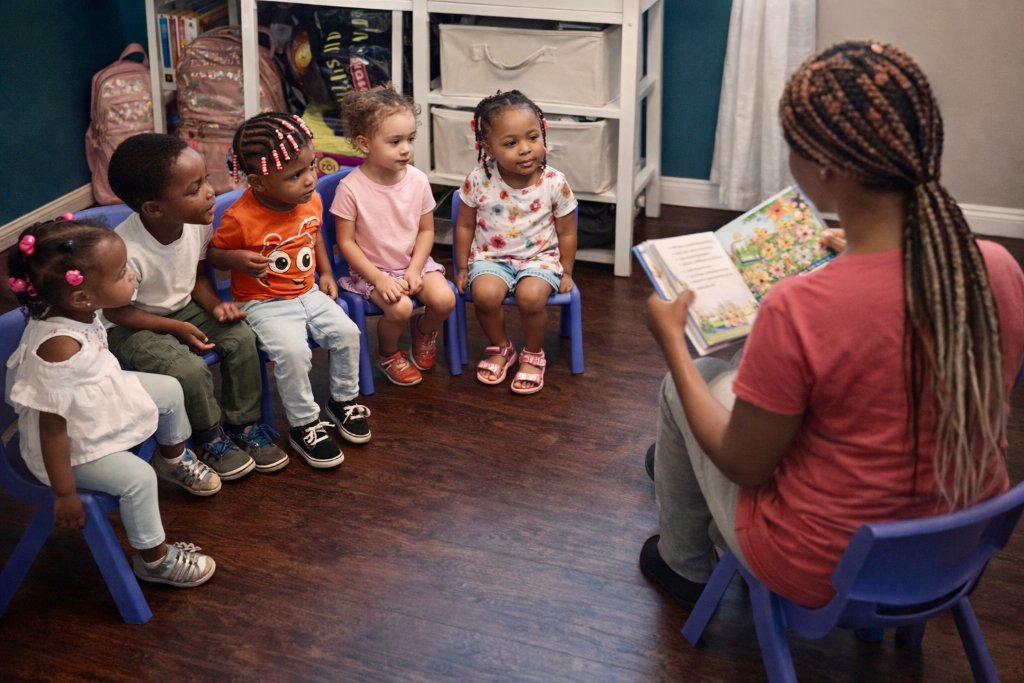 Children participating in circle time learning activity at Insight Kidz Care in Baltimore Maryland
