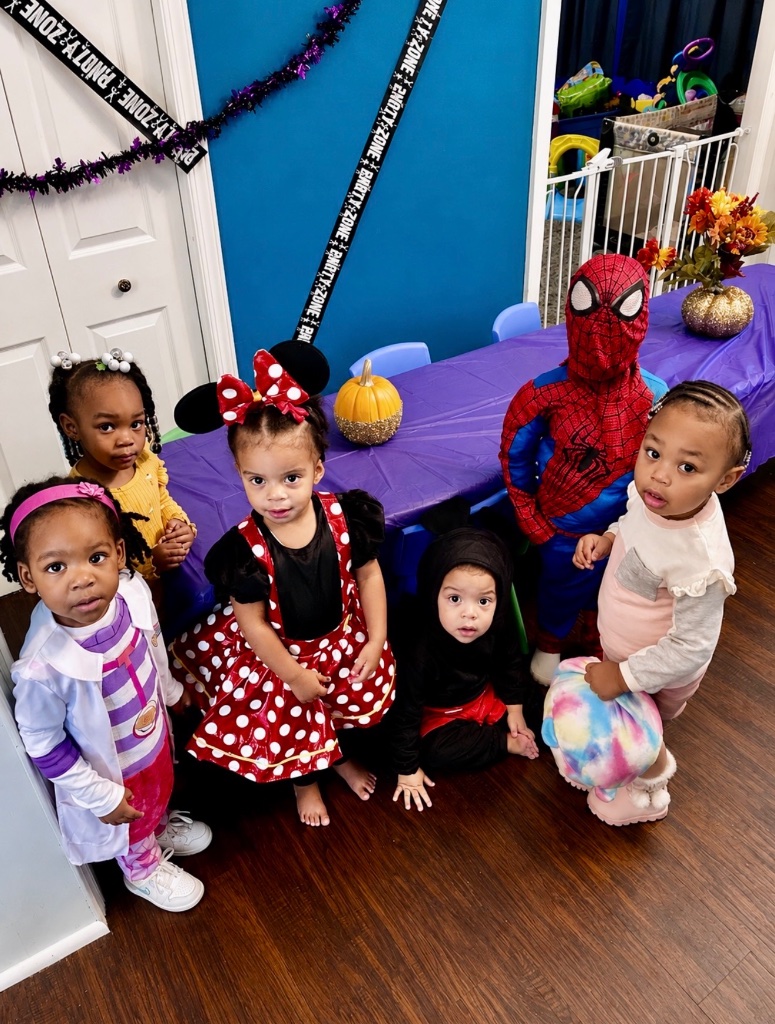 Halloween Costume Friends Children dressed in Halloween costumes including Minnie Mouse and Doc McStuffins at Insight Kidz Care family child care Halloween celebration