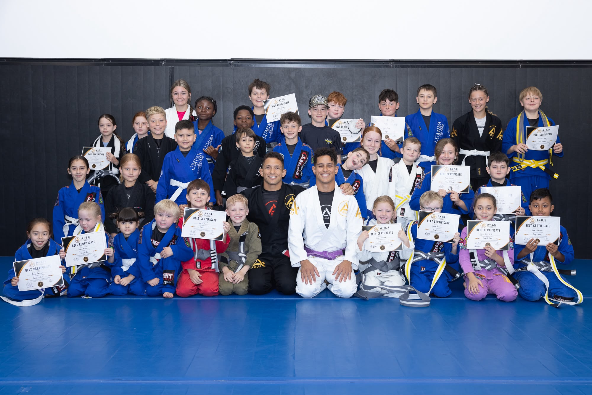 Children learning jiu-jitsu