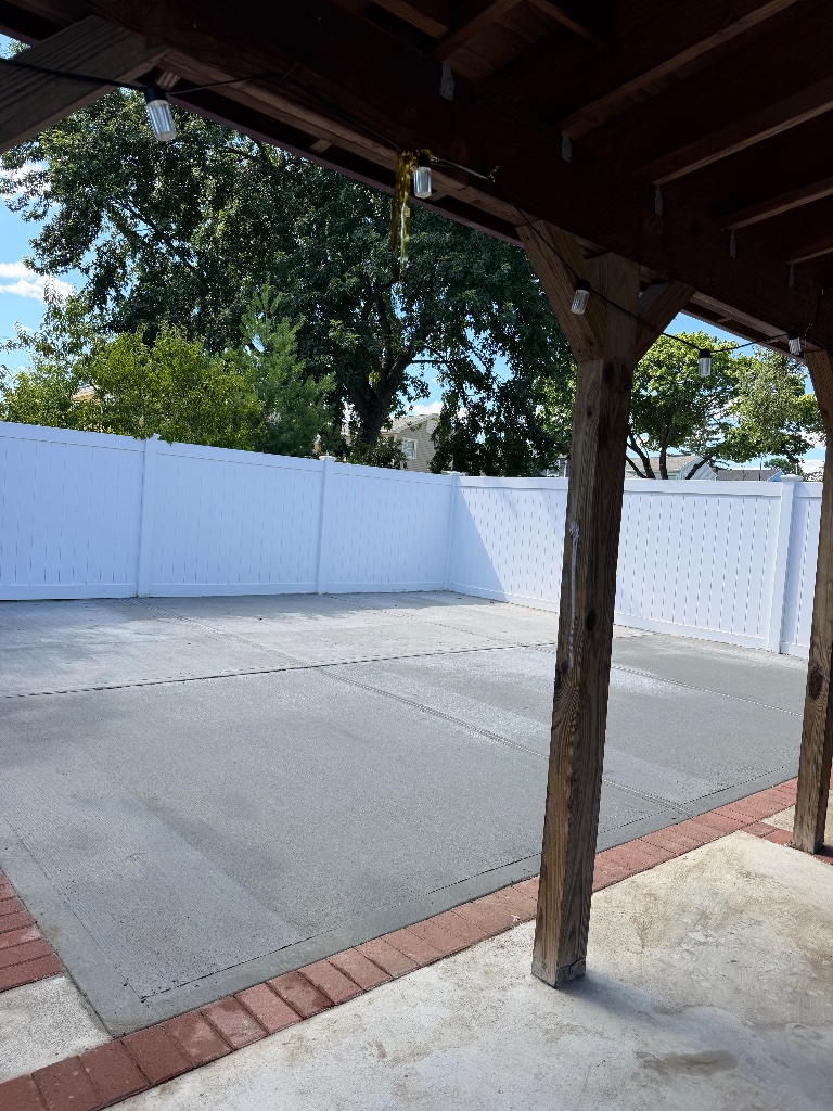 Concrete Patio with Brick Paver Border - Photo 2 - TrueCraft Construction