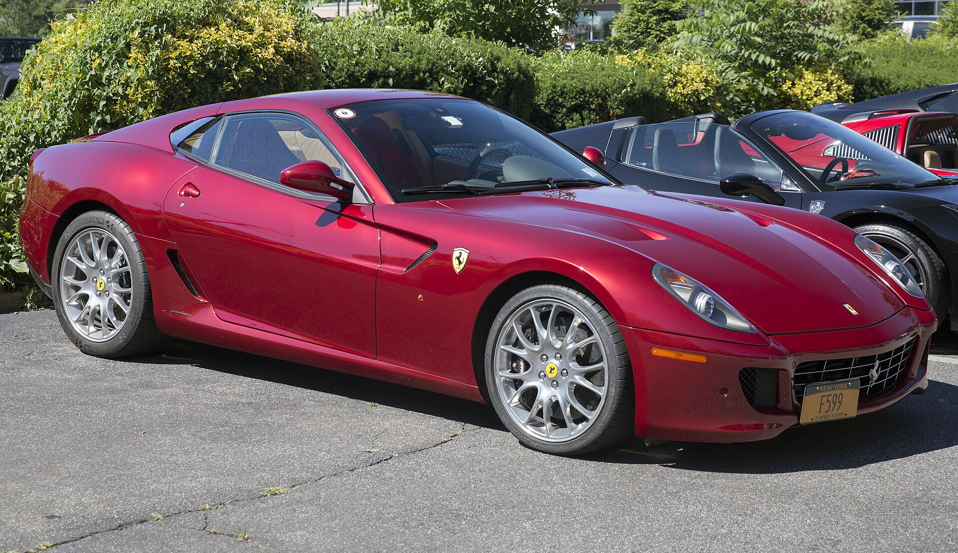2009 Ferrari 599 GTB Fiorano F1 (semi-automatic, that is) at a Cars and Coffee at Autosports Designs in Huntington, NY (Long Island). Rosso Fiorano with a Beige interior.