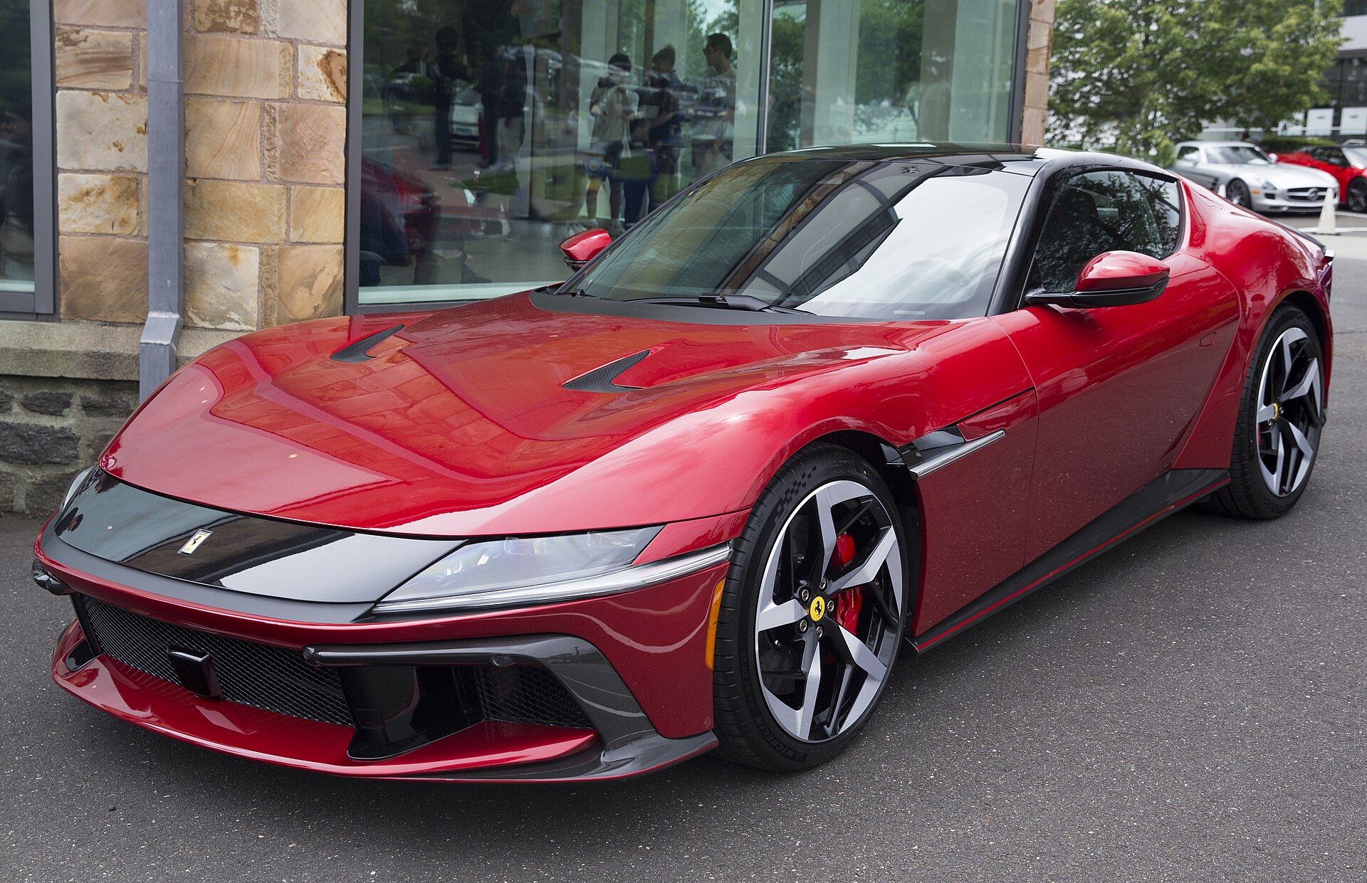 2025 Ferrari 12Cilindri in Rosso Imola; on display at Miller Motorcars' "Spite Show".