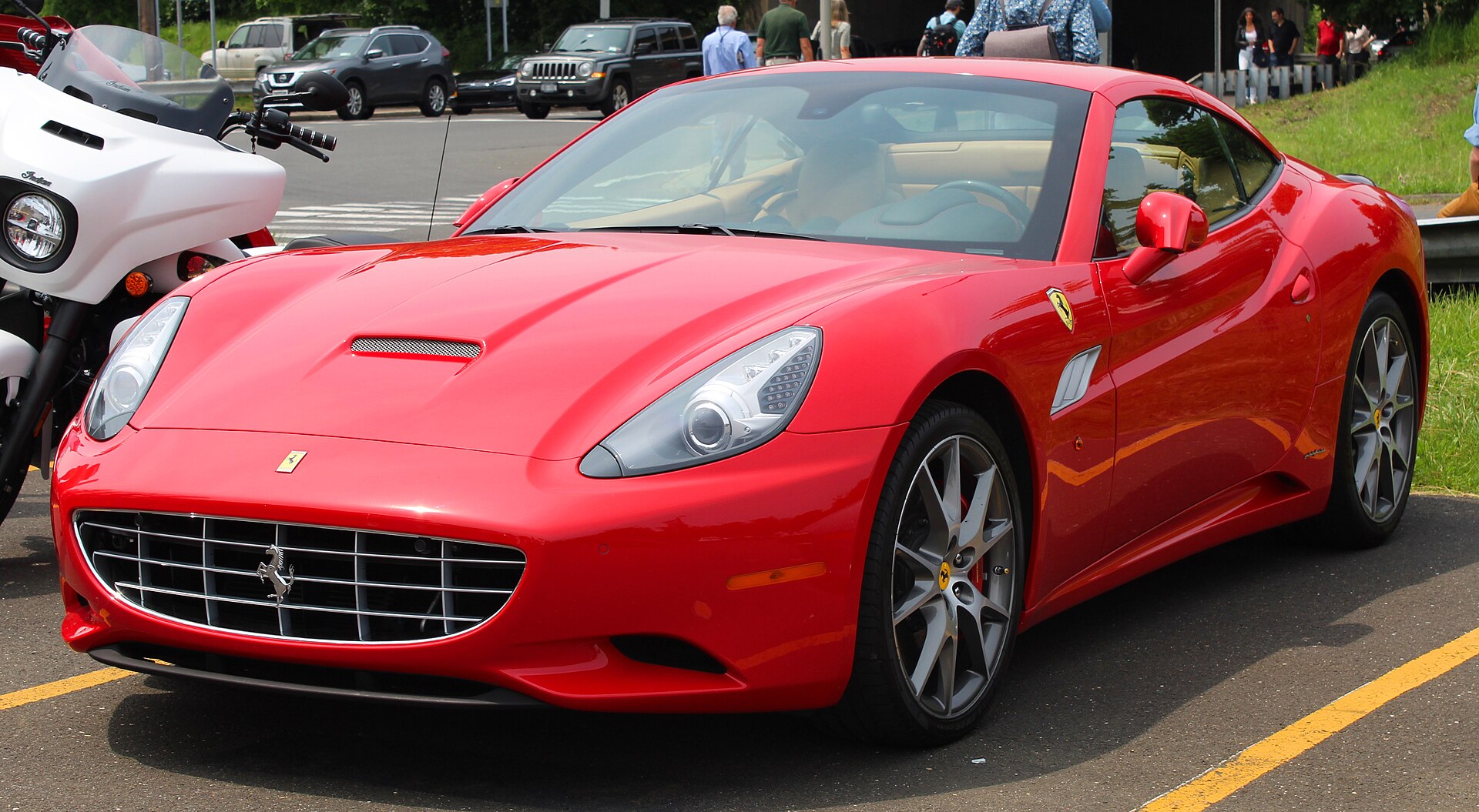 A 2013 Ferrari California photographed in Greenwich Concours d'Elégance Hagerty parking lot , Connecticut , USA