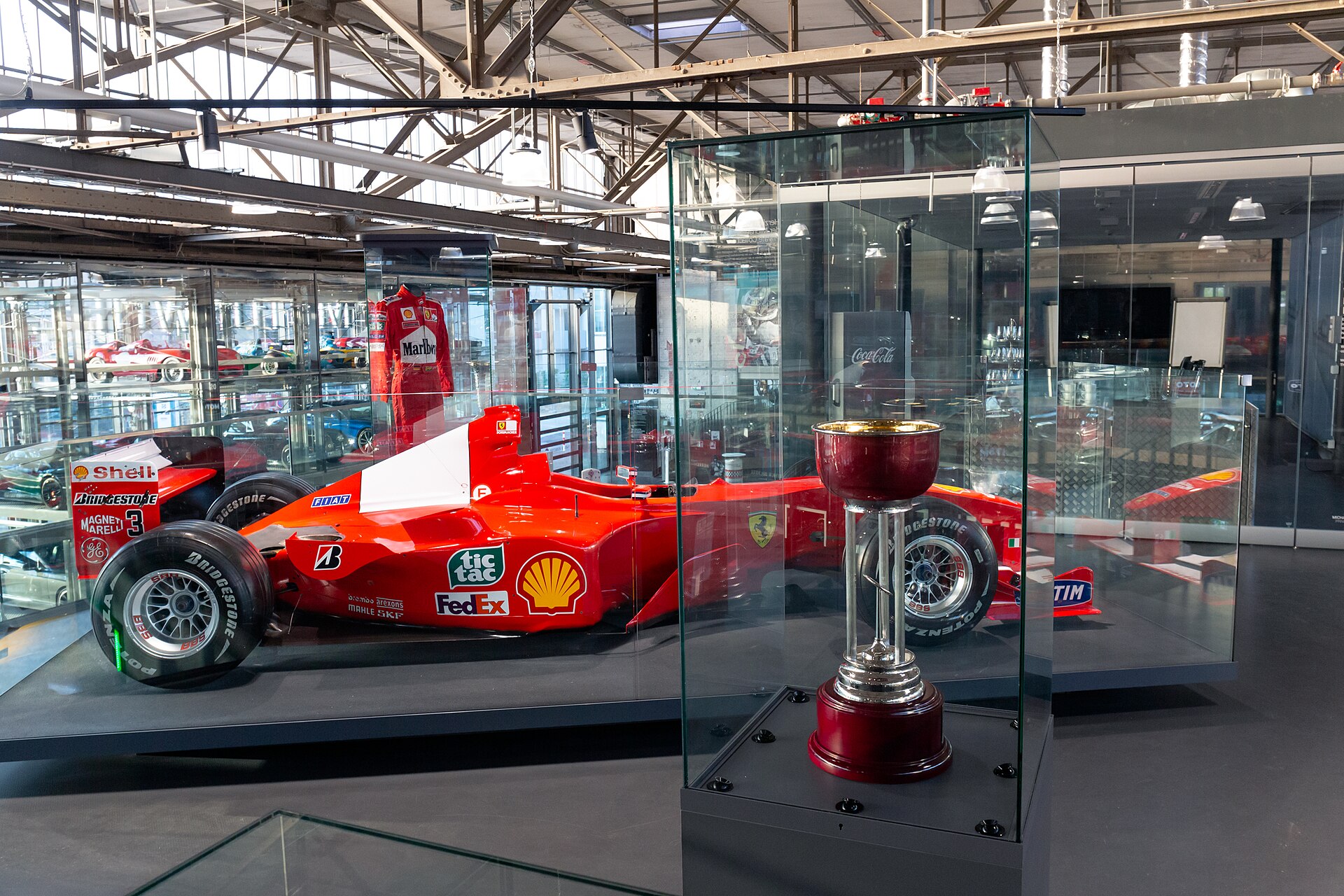 Ferrari F1-2000 displayed with the trophy from Michael Schumacher’s 2000 Japanese Grand Prix victory.
