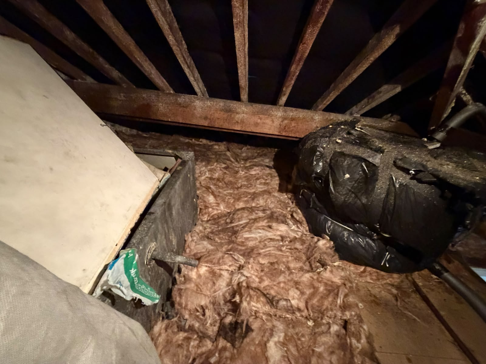 After — foam fully stripped and loft re-insulated with mineral wool
