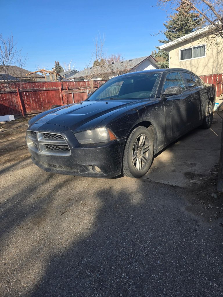Dirty Dodge Charger exterior before professional detailing Lethbridge AB