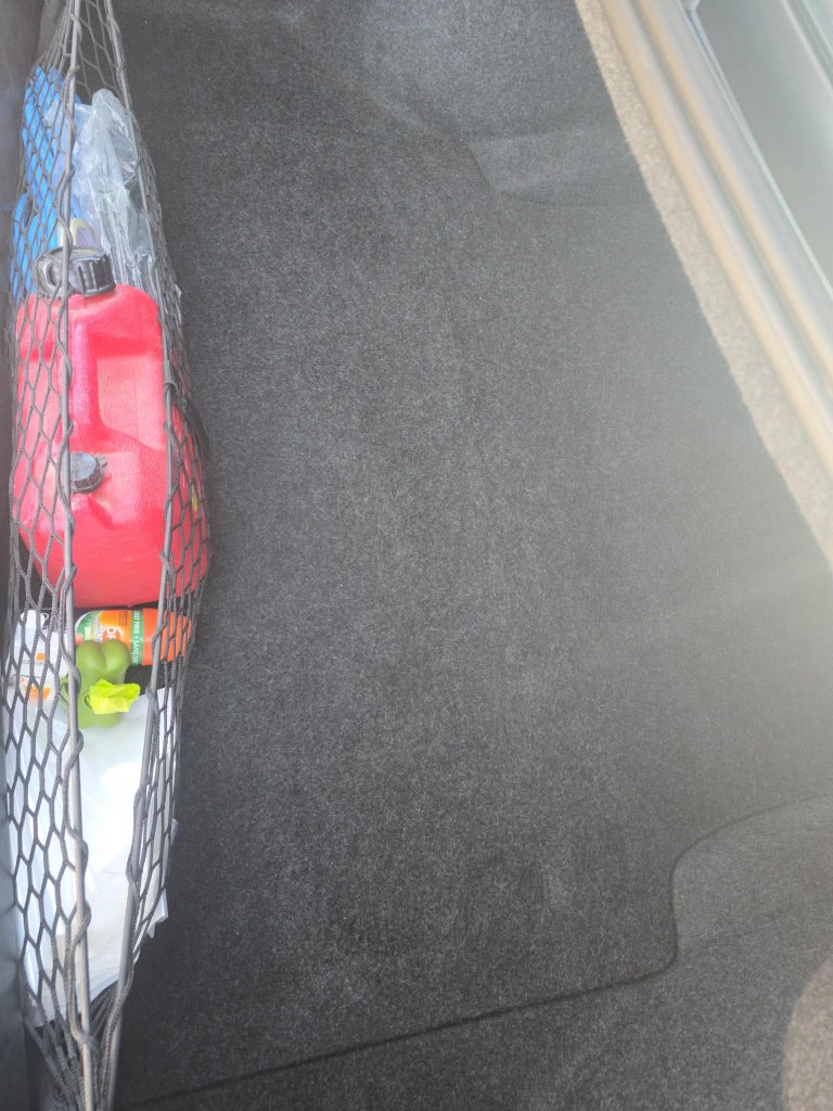 Car trunk carpet after professional cleaning Lethbridge AB