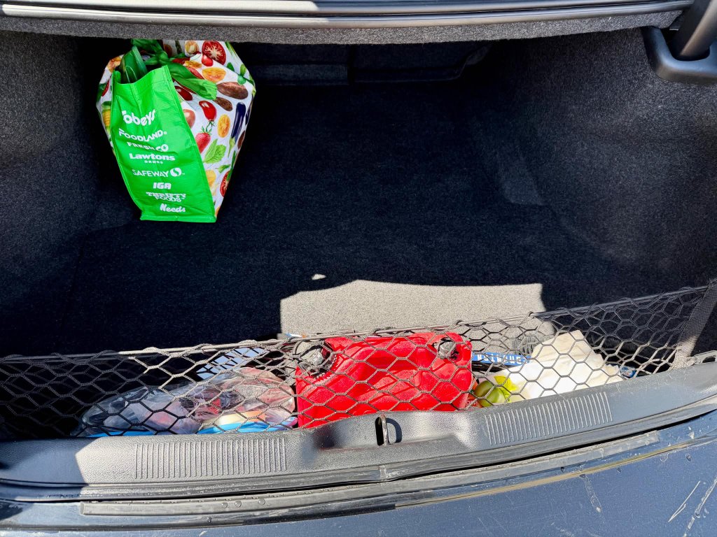 Dirty car trunk before professional detailing Lethbridge AB