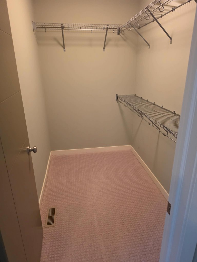 Clean walk-in closet after professional move-out cleaning Lethbridge AB