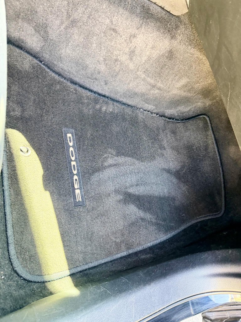 Dodge floor mat before professional car detailing Lethbridge AB