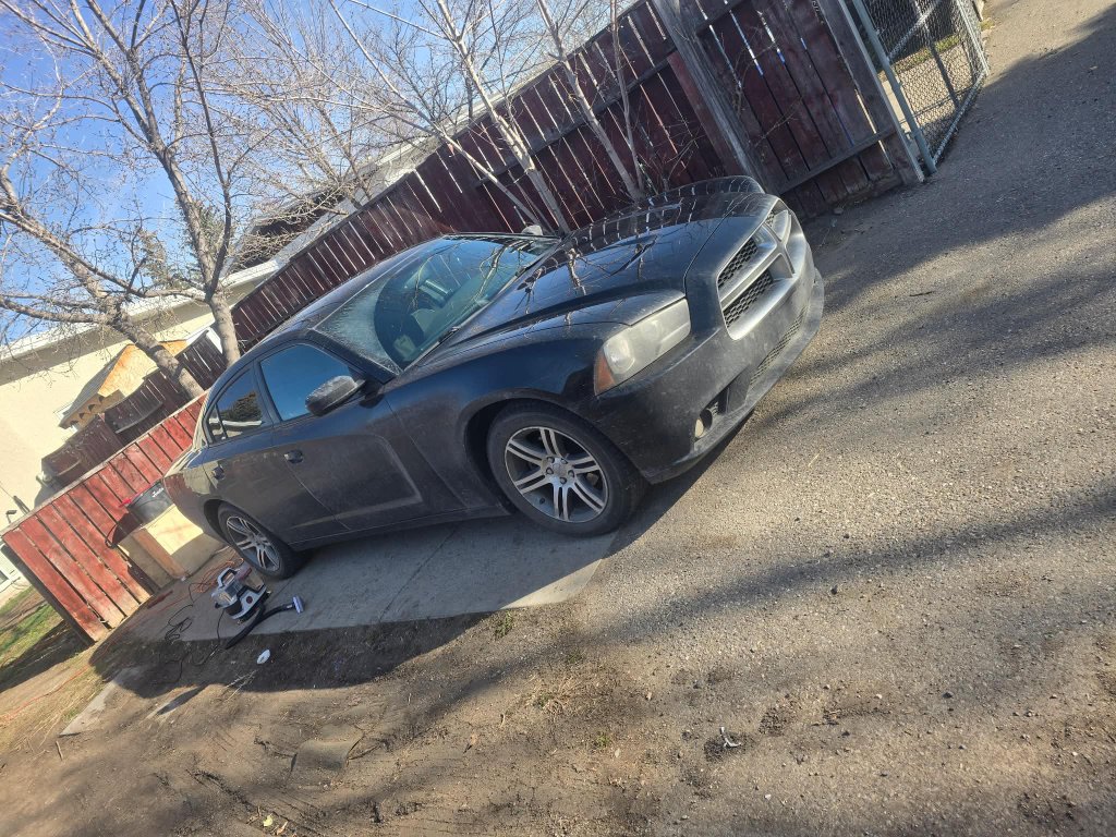Dirty Dodge vehicle exterior before professional car detailing Lethbridge