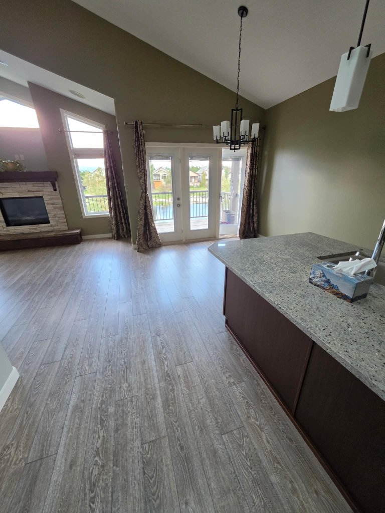 Clean open concept living room and kitchen after professional home cleaning Lethbridge