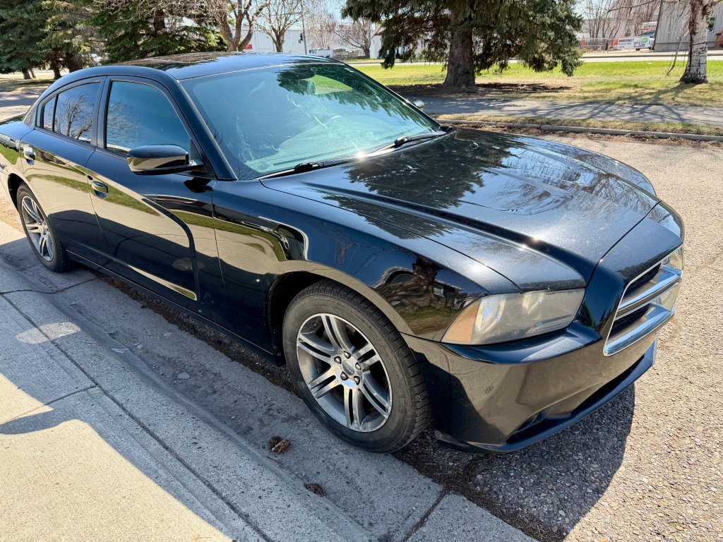 Dodge Charger side view after professional car detailing Lethbridge