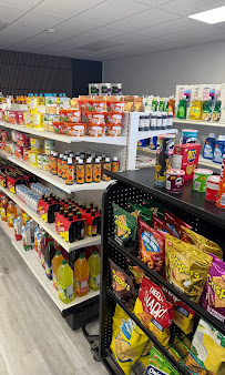Marché Isadora Inc. — allée d'épicerie et produits du quotidien