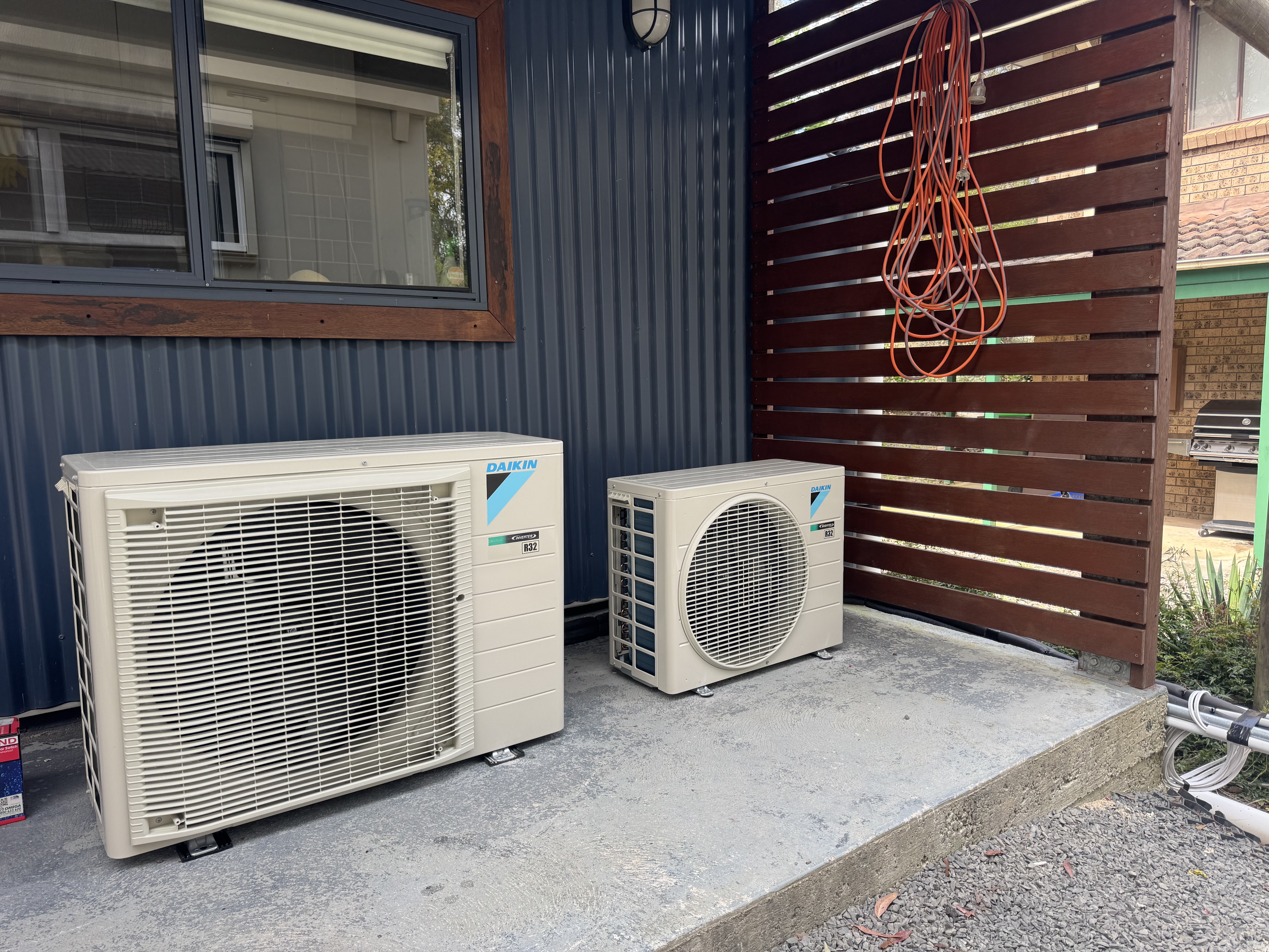 Two Daikin outdoor air conditioning units positioned beside the Mt Victoria property