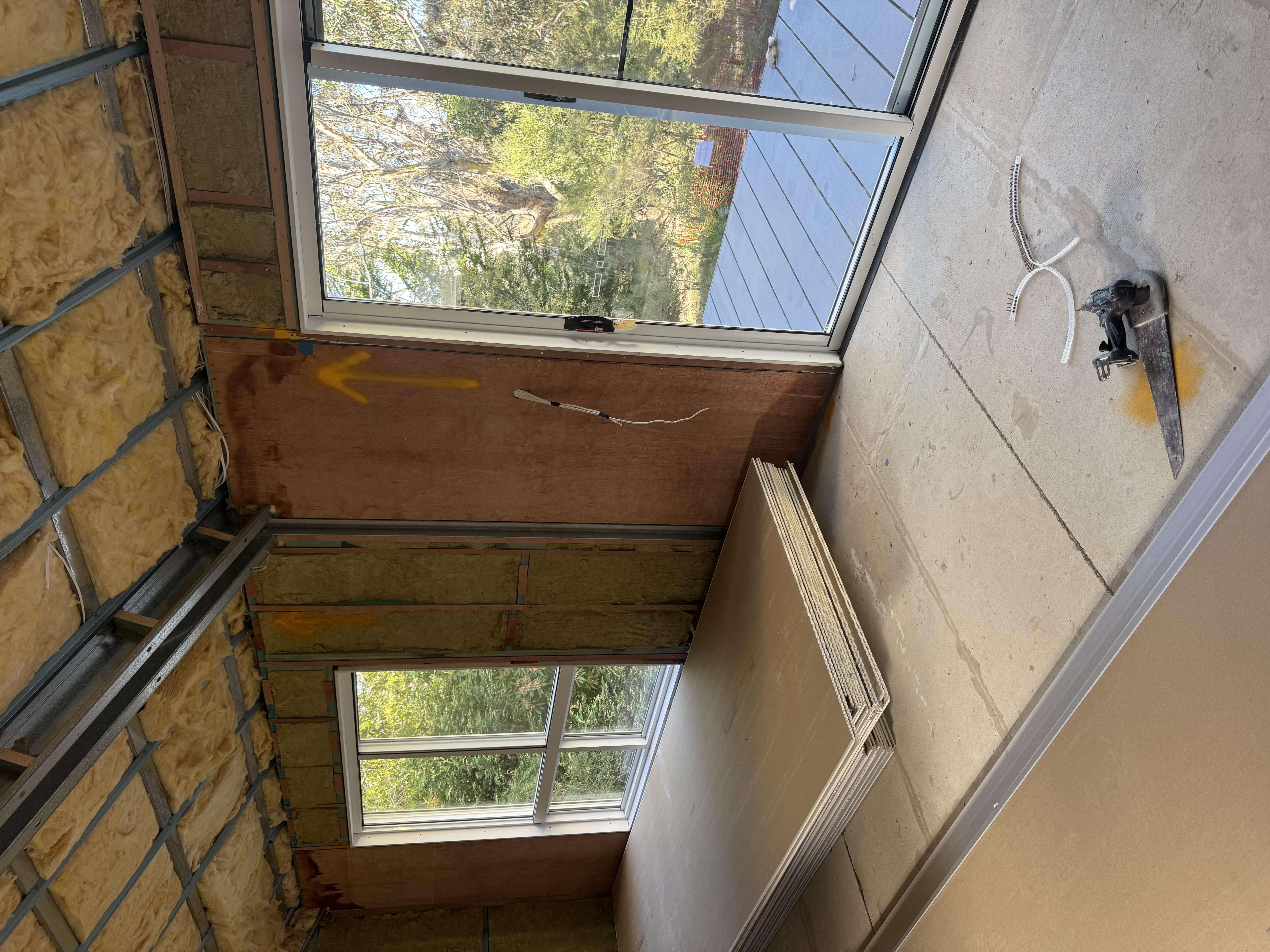 Room with exposed framing and rough-in cabling at the Mt Victoria air conditioning project