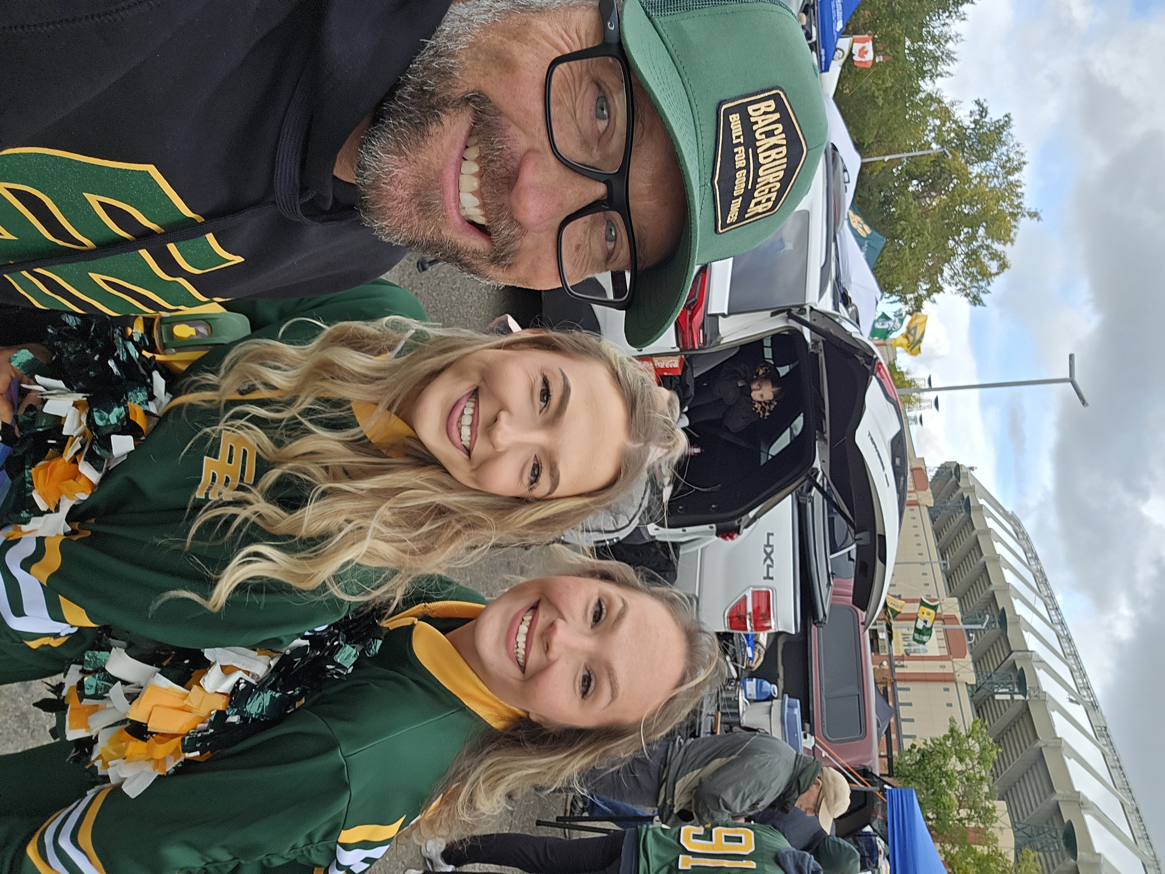 Tailgate crew in the Good Times hat