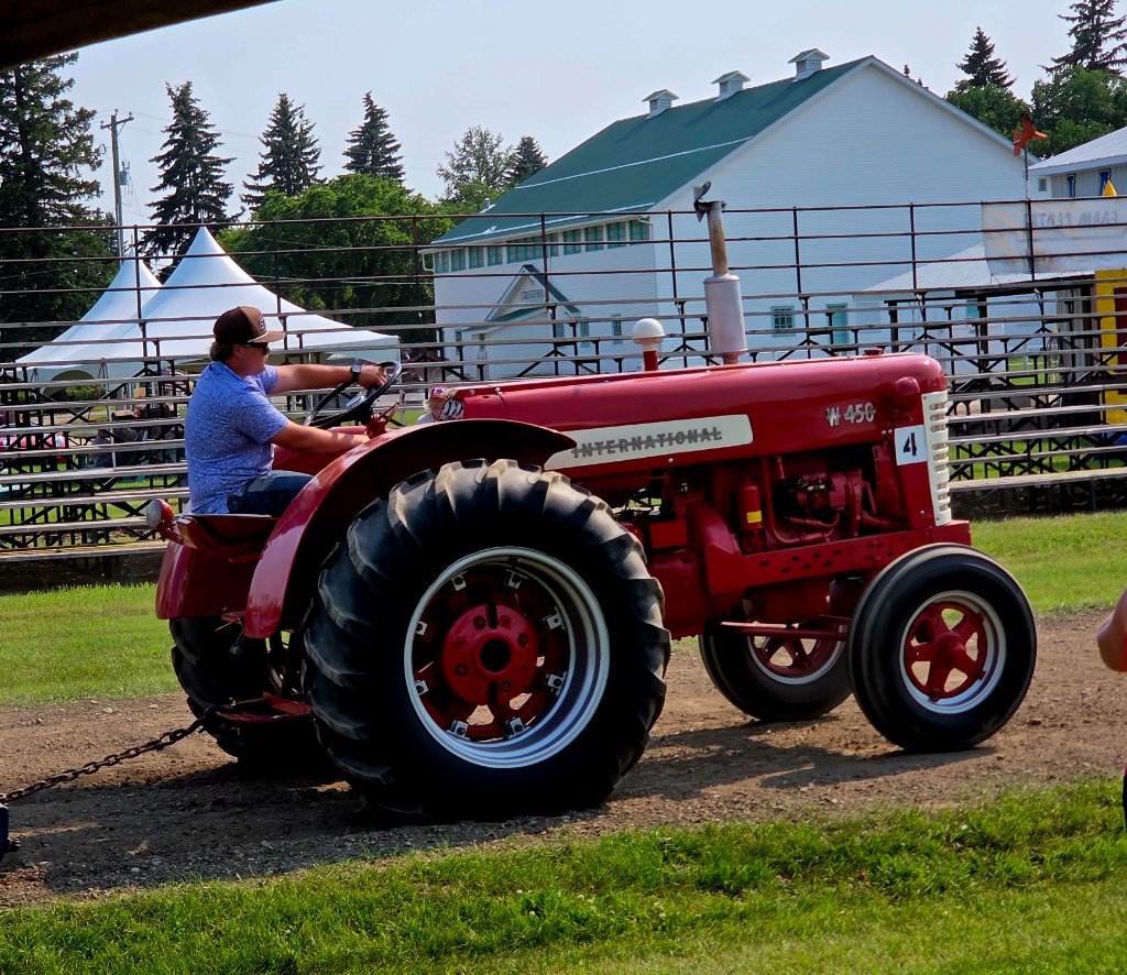 Yellow McCormick Farmall Super M — Pull