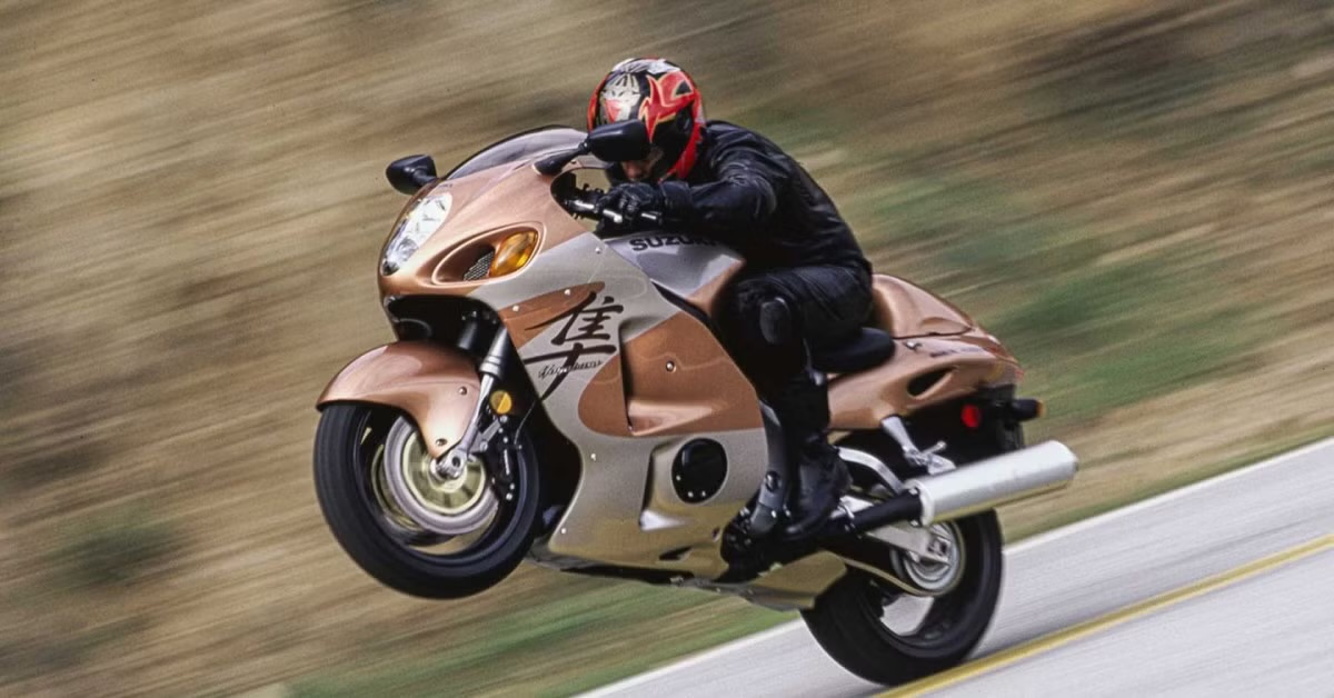 Gold Suzuki Hayabusa performing a wheelie