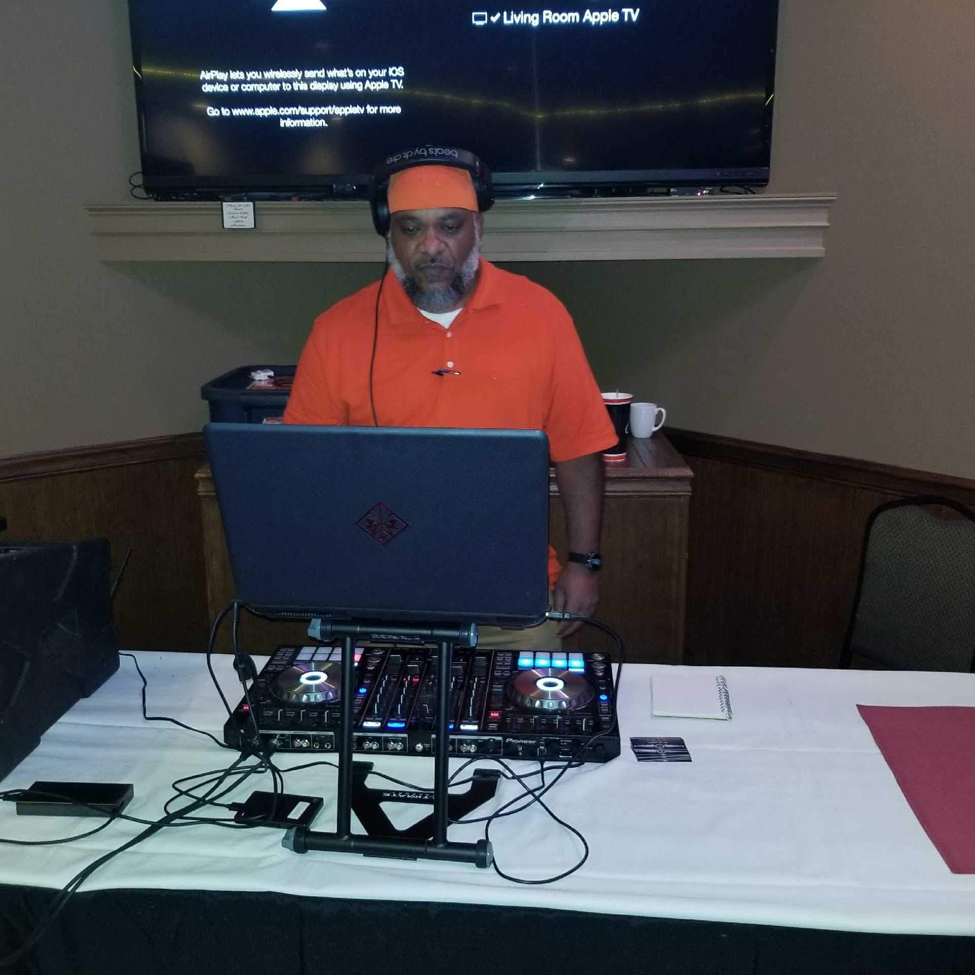 DJ Eddietunez working the controller during an indoor event