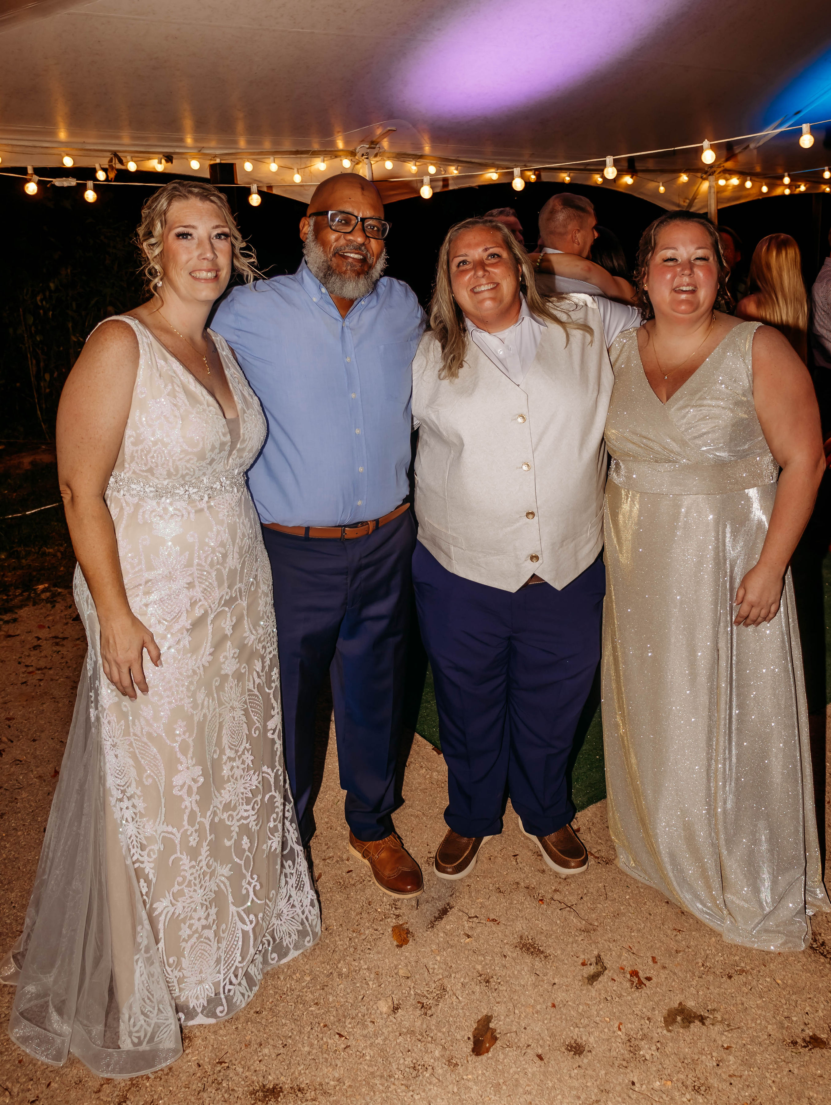 The Jones Collective team posing under the event tent
