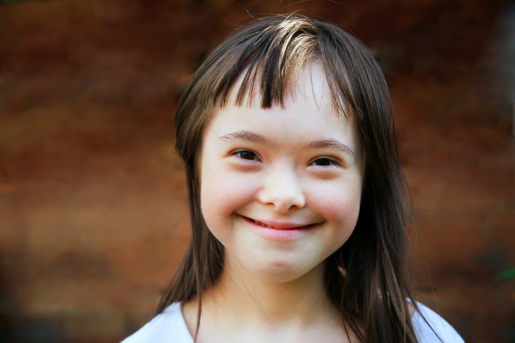Student with special needs smiling