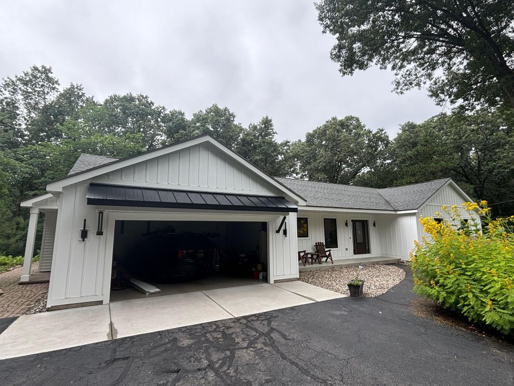 Completed siding installation, front view, on a home in Grandville, MI