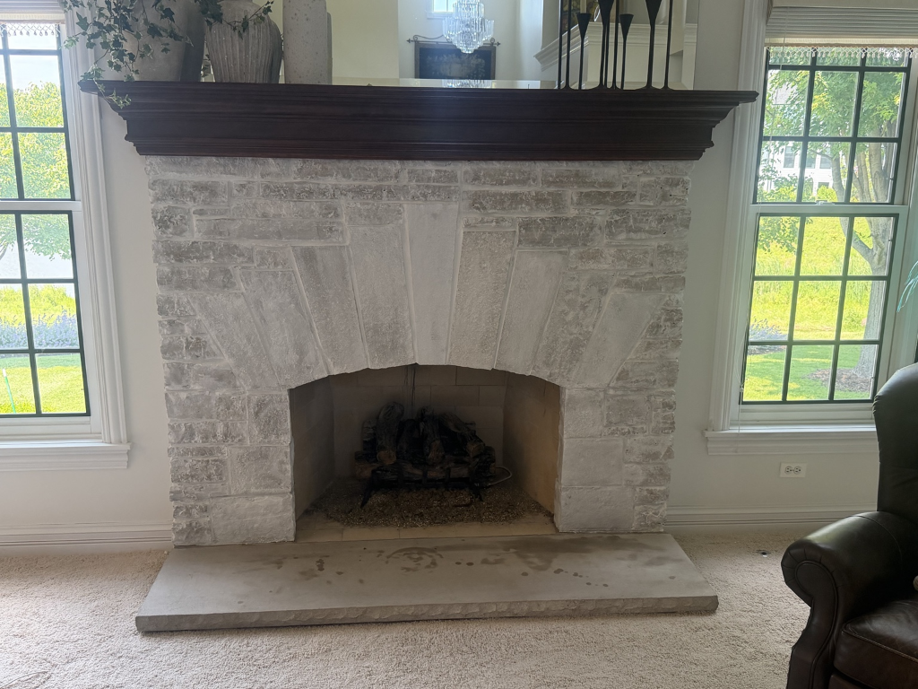 Partial fireplace limewashing in progress