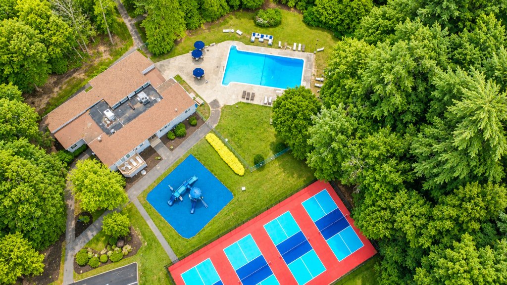 Pool deck with lounge and dining areas