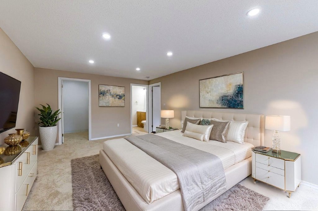Master bedroom with ensuite and recessed lighting