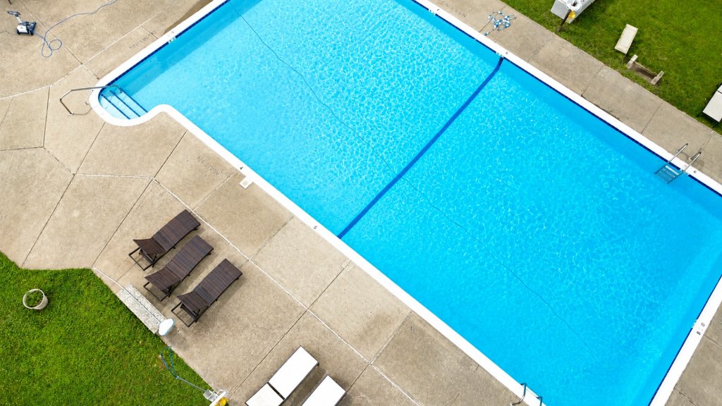 Swimming pool with lounge chairs
