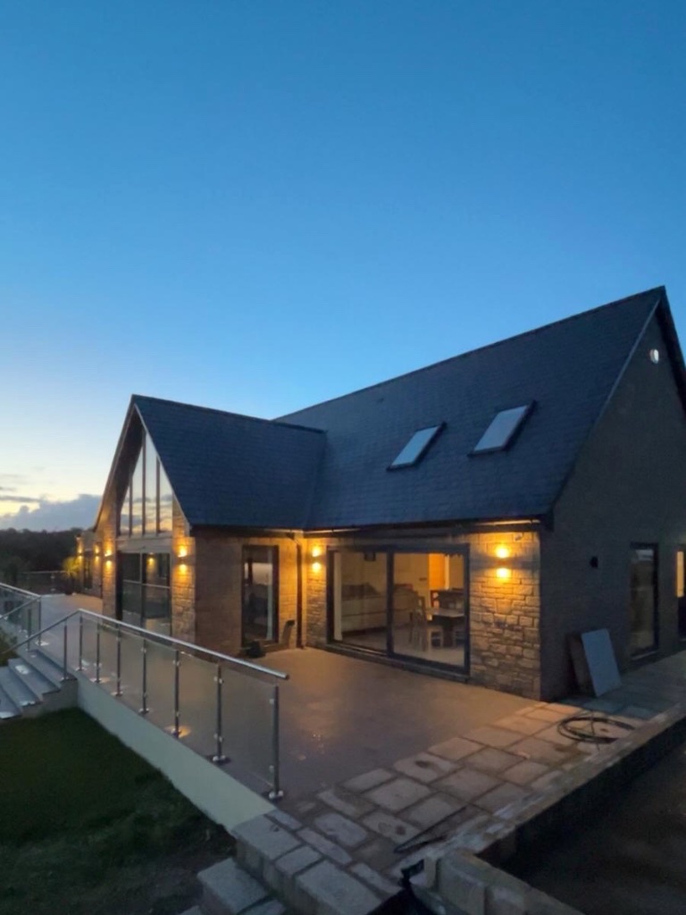 The Paddock - exterior bespoke lighting at dusk