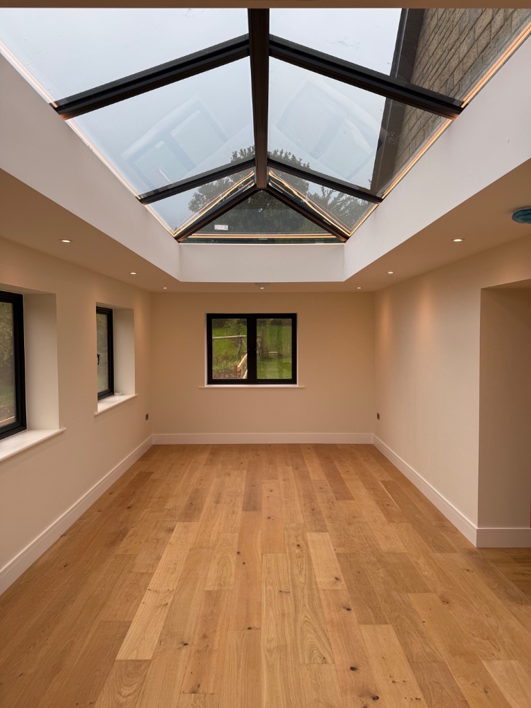 Garden room - recessed lighting and large rooflight