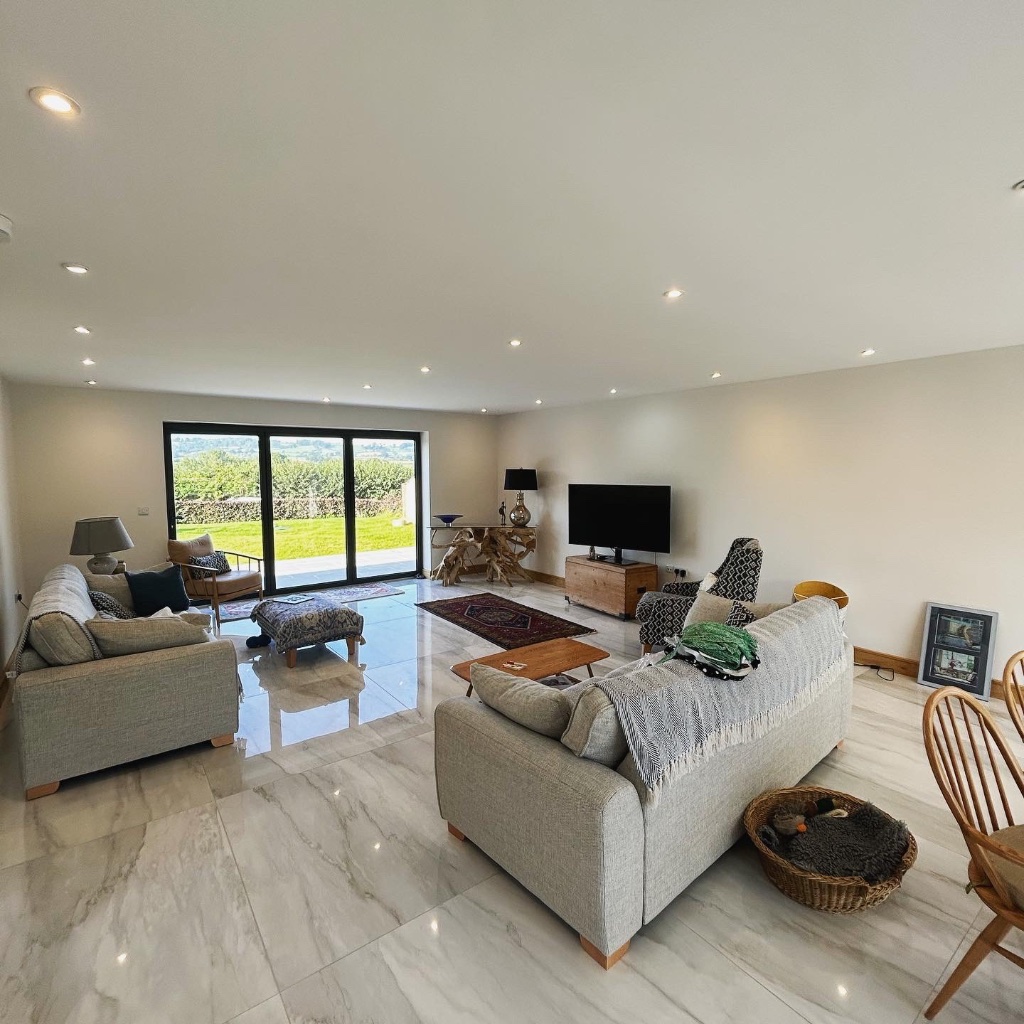 Open-plan living area - recessed LED downlights throughout