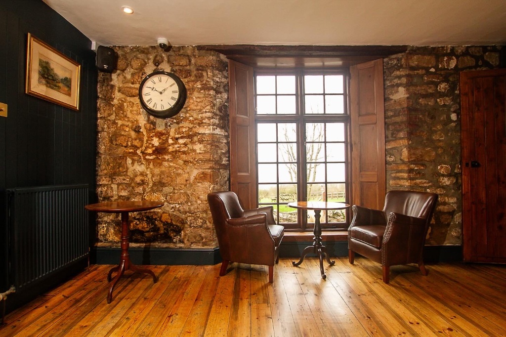 Lounge seating area with warm ambient lighting