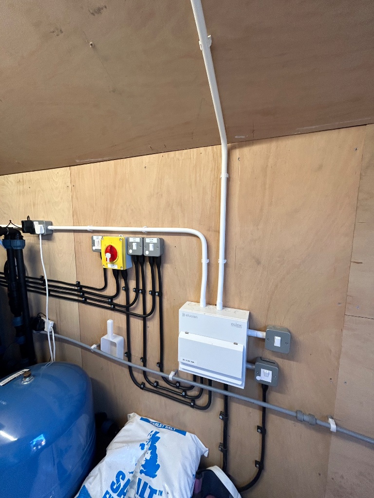 Heat pump controls, isolators, and distribution board