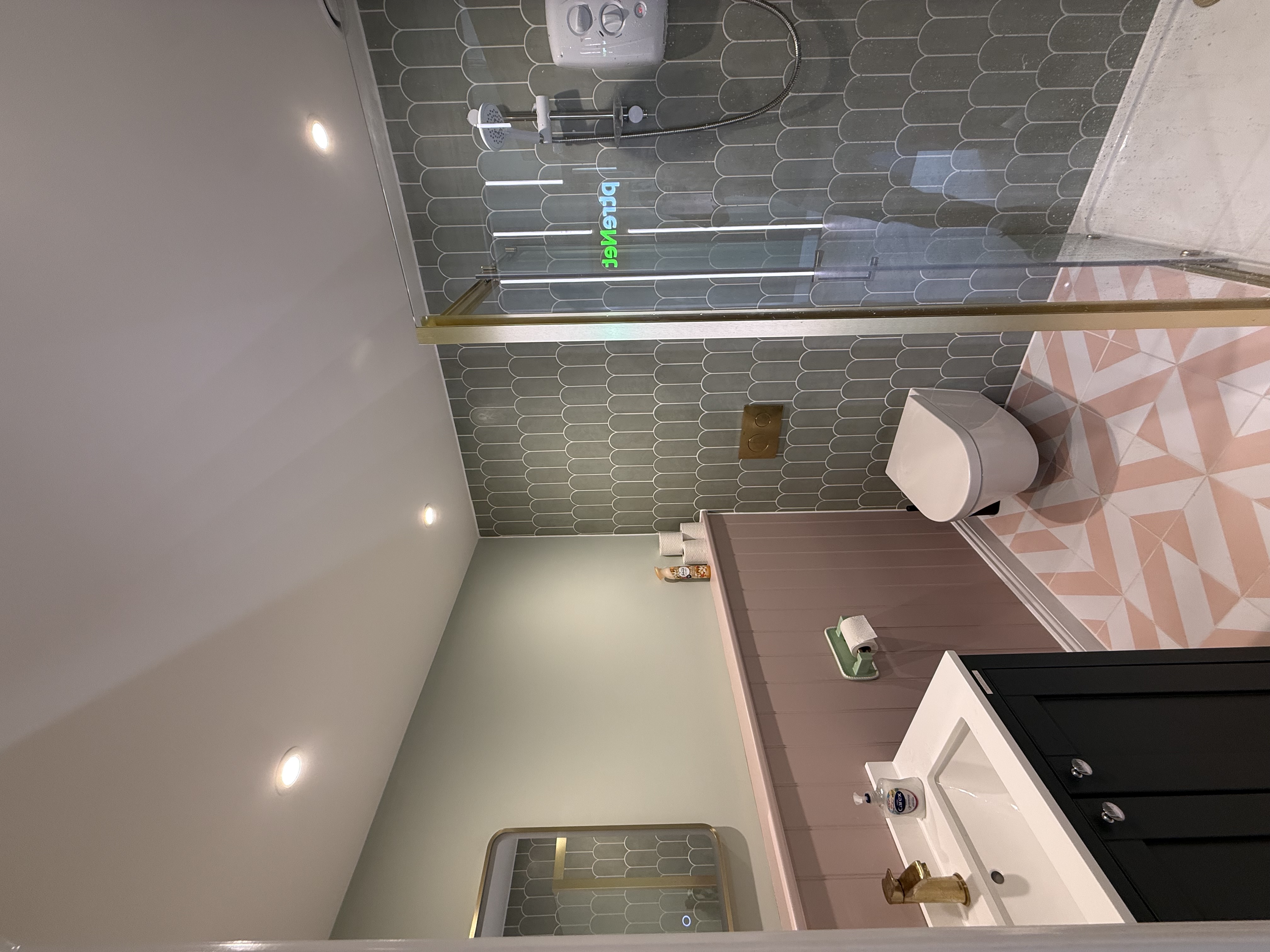 Completed bathroom with neon feature lighting, Sceptre Net commercial electrical project