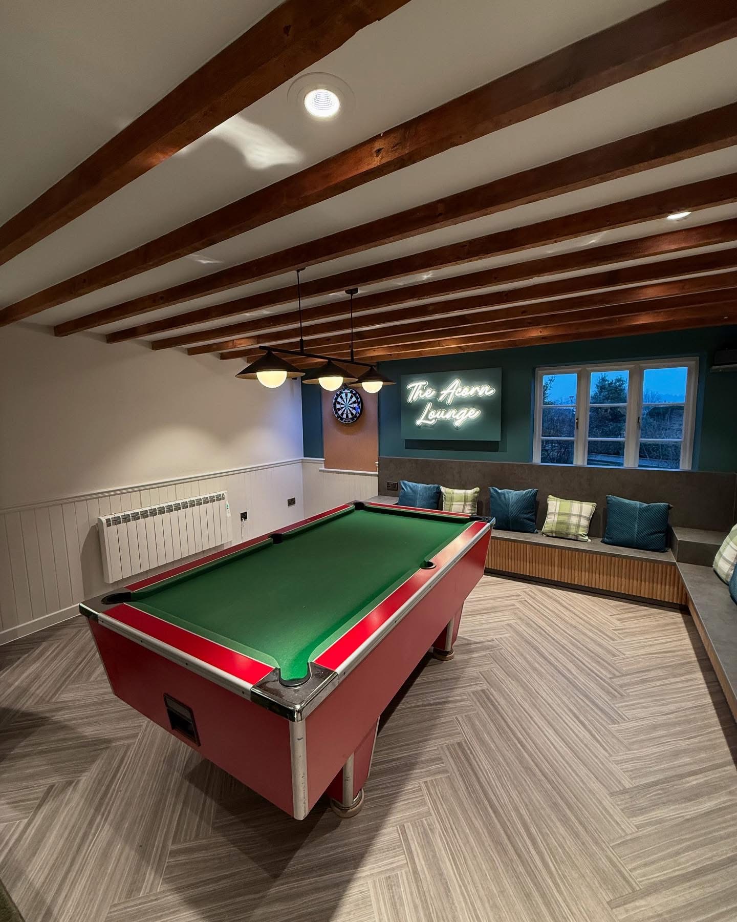 Lounge area - pendant lighting, neon signage and recessed spotlights